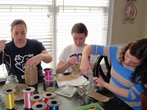 Mary Grace, Emily, and Bethany deorating flower vases!